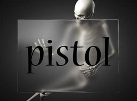 palabra de pistola sobre vidrio y esqueleto foto