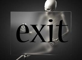 exit word on glass and skeleton photo