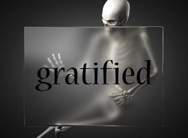 palabra gratificada en vidrio y esqueleto foto