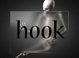 hook word on glass and skeleton photo