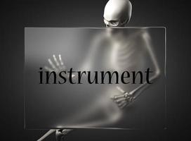 instrument word on glass and skeleton photo