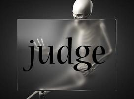 judge word on glass and skeleton photo