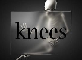 knees word on glass and skeleton photo