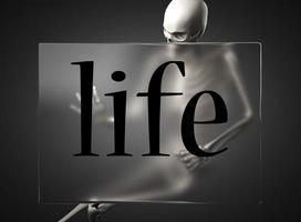 life word on glass and skeleton photo