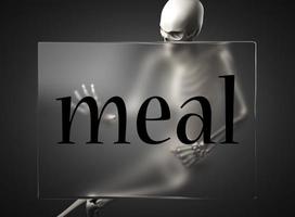 meal word on glass and skeleton photo