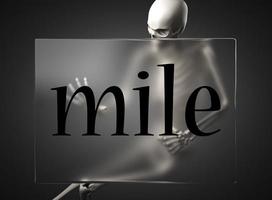 mile word on glass and skeleton photo