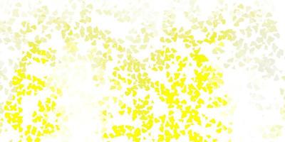 Light yellow vector pattern with abstract shapes.