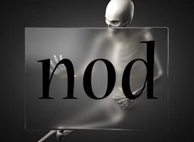 nod word on glass and skeleton photo