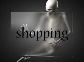 shopping word on glass and skeleton photo