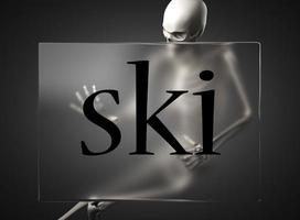 ski word on glass and skeleton photo