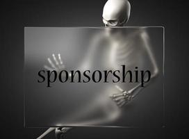 sponsorship word on glass and skeleton photo