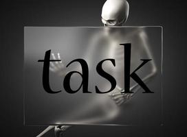 task word on glass and skeleton photo