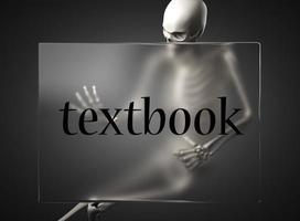 textbook word on glass and skeleton photo