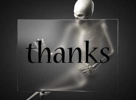 thanks word on glass and skeleton photo
