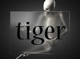 tiger word on glass and skeleton photo