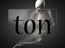 ton word on glass and skeleton photo