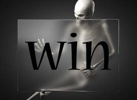 win word on glass and skeleton photo