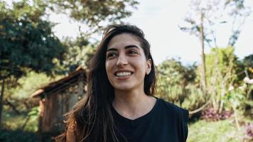 Smiling latin Brazilian woman in the farm. Joy, positive and love. photo