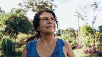 Smiling latin Brazilian woman in the farm. Joy, positive and love. photo