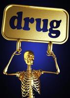 palabra de drogas y esqueleto dorado foto