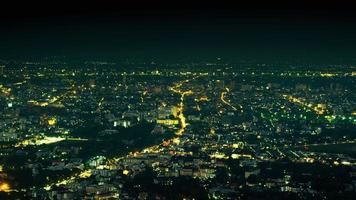 Time lapse of the night city in Chiang Mai, Thailand. The view from Doi Suthep Viewpoint is a popular tourist destination for tourists. Landscape view and Twilight scene of Chiang Mai city from hill. video