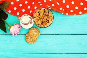 Breakfast on a blue wooden table. Tablecloth in polka dots and mothers day. Copy space and selective focus photo