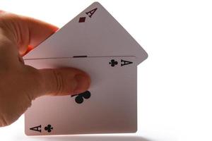 Man holding aces in hand photo