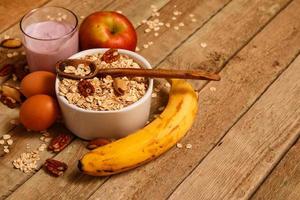 Healthy breakfast on wooden table photo