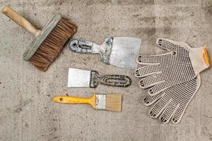 Spatulas, brushes and gloves photo