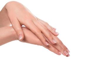 Hands with french manicure photo