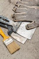 Spatulas, brush and gloves photo