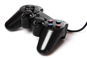 Black gamepad on white background photo