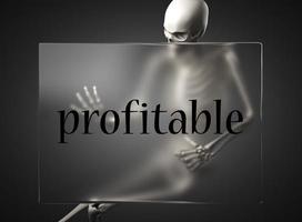 profitable word on glass and skeleton photo