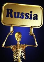 Russia word and golden skeleton photo