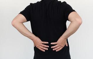 asian man with lumbar pain, backache and massage on waist to pain relief.