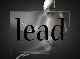 lead word on glass and skeleton photo