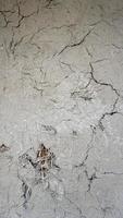 crack on clay wall textures and backgrounds photo