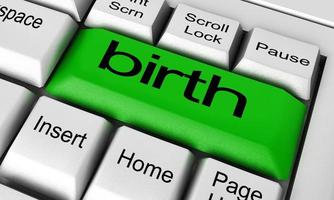 birth word on keyboard button photo