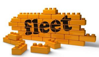 fleet word on yellow brick wall photo