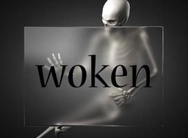 woken word on glass and skeleton photo