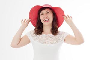 Happy woman in summer hat isolated on white background. Sun protection skin care and vacation holidays concept. Middle age female with white healthy teeth and menopause. Travel vacation. Copy space photo