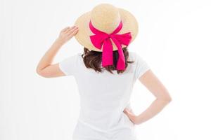 Closeup of woman in summer beach hat back view isolated on white background. Template t shirt rear view. Vacation and fun holidays concept. Copy space photo