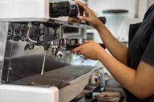 close up of coffee machine making coffee photo