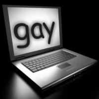 palabra gay en la computadora portátil foto