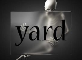 yard word on glass and skeleton photo