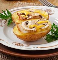 Baked potato with mushrooms and bacon photo