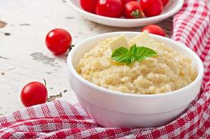 Porridge in a bowl photo