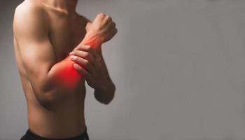 Male patient having pain, aches, pain in the arm, bone, tendon, pain Medical concept injury photo
