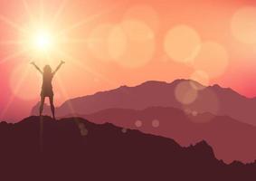 silhouette of a female stood on top of a mountain against sunset sky vector