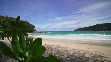 Blue ocean white sand beach and water surface texture. Foamy waves with sky. Beautiful tropical beach. Amazing Sandy coastline with white sea waves. Nature, seascape and summer concept. video